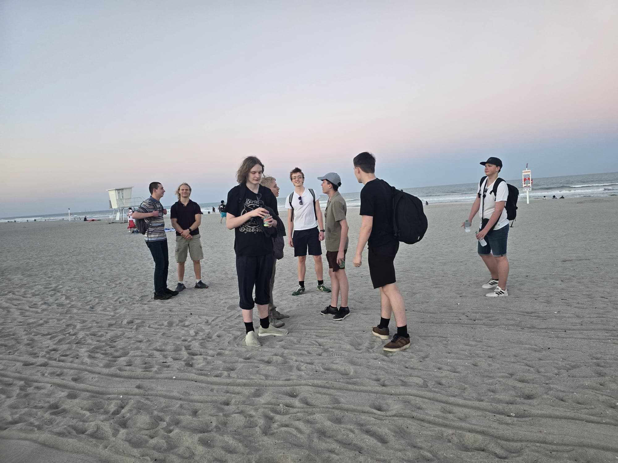 Laget på stranden i solnedgången, Orlando 2026